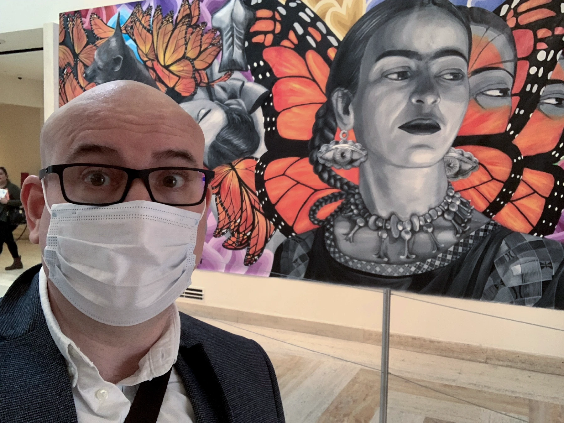 Marin standing in front of a Frida Kahlo painting in the Portland Art Museum