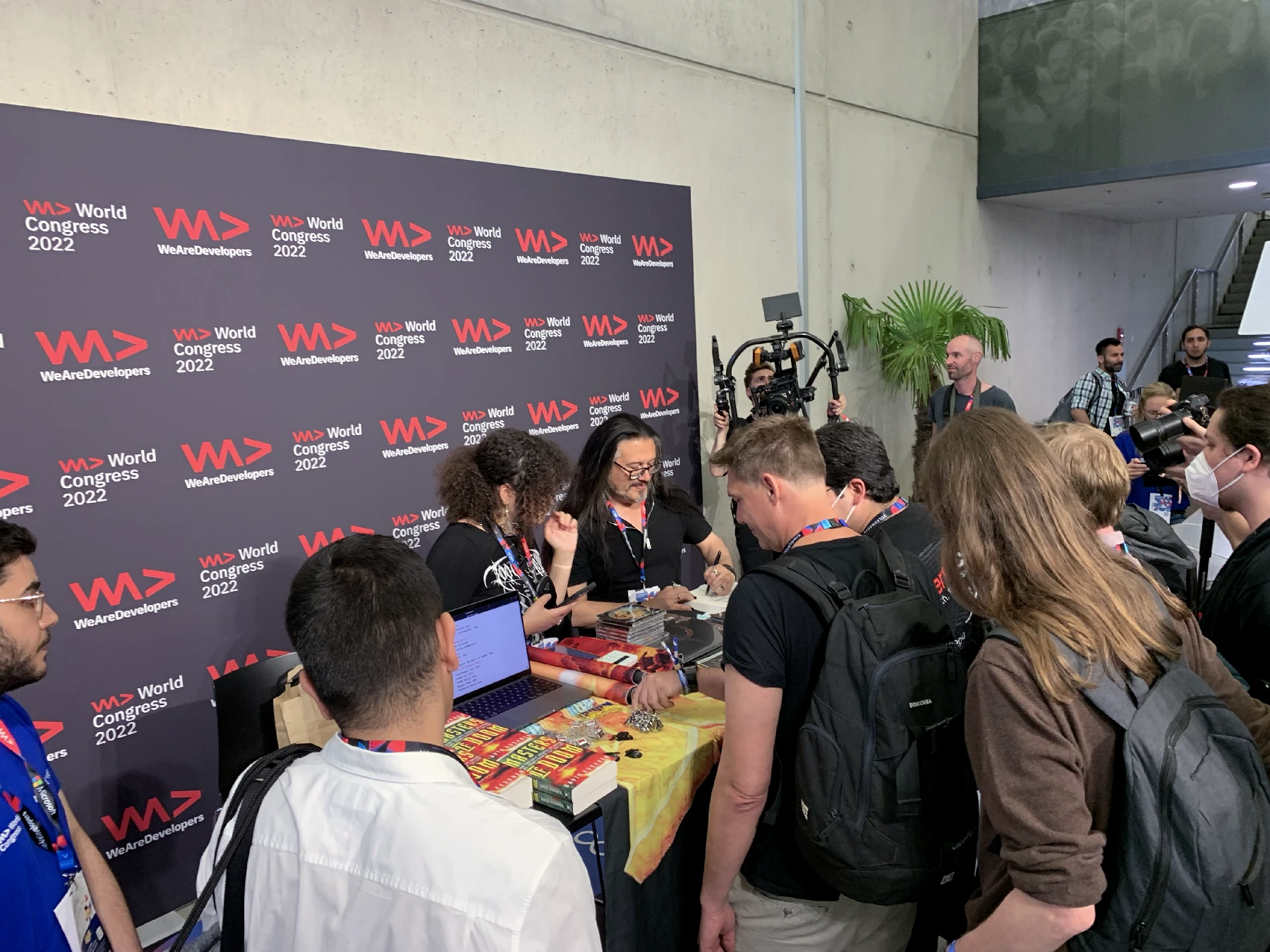 John Romero from ID Software at WeAreDevelopers 2022 signing books