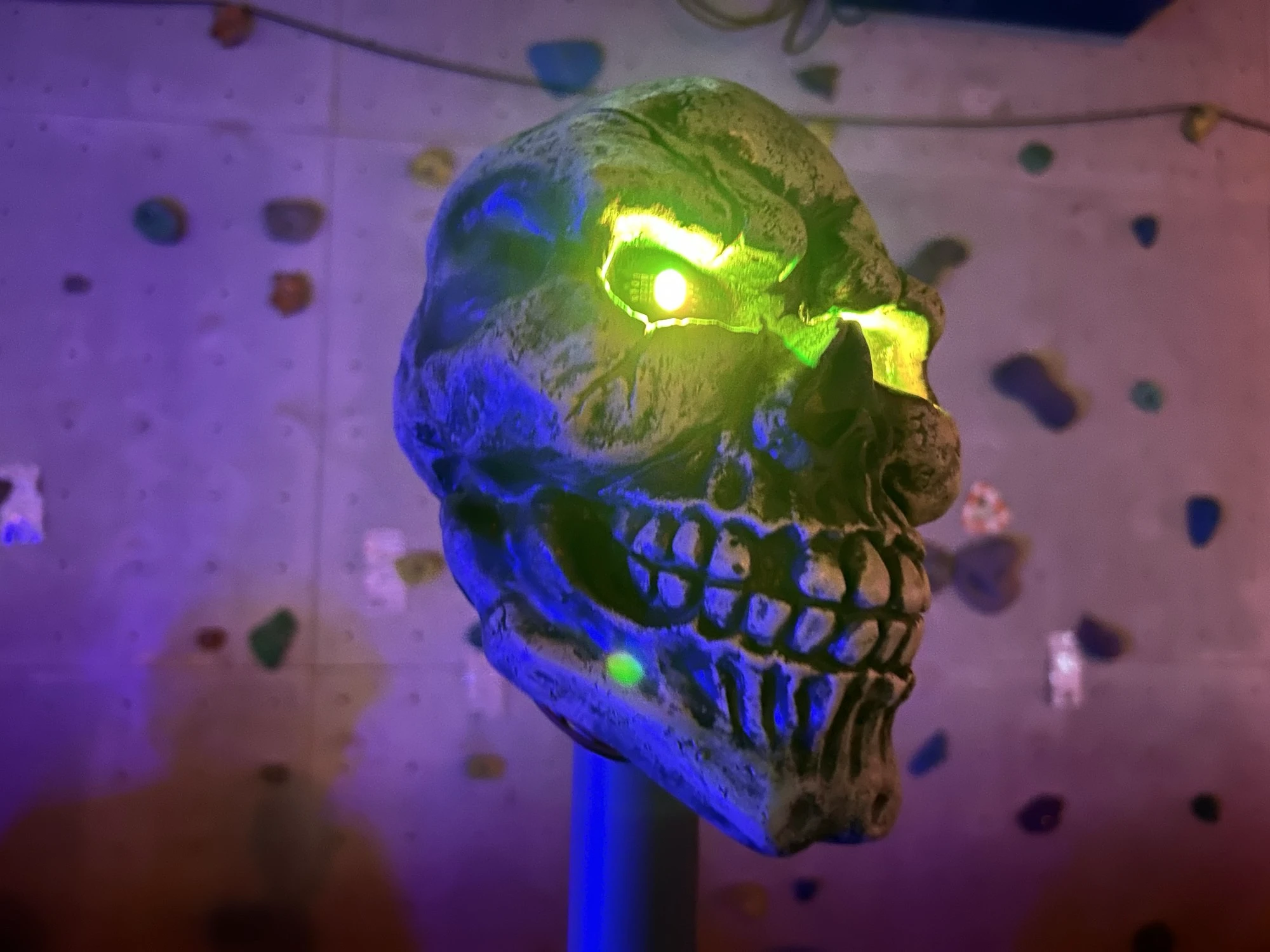 A demo party participant had decorated their desk with a skull with glowing eyes.