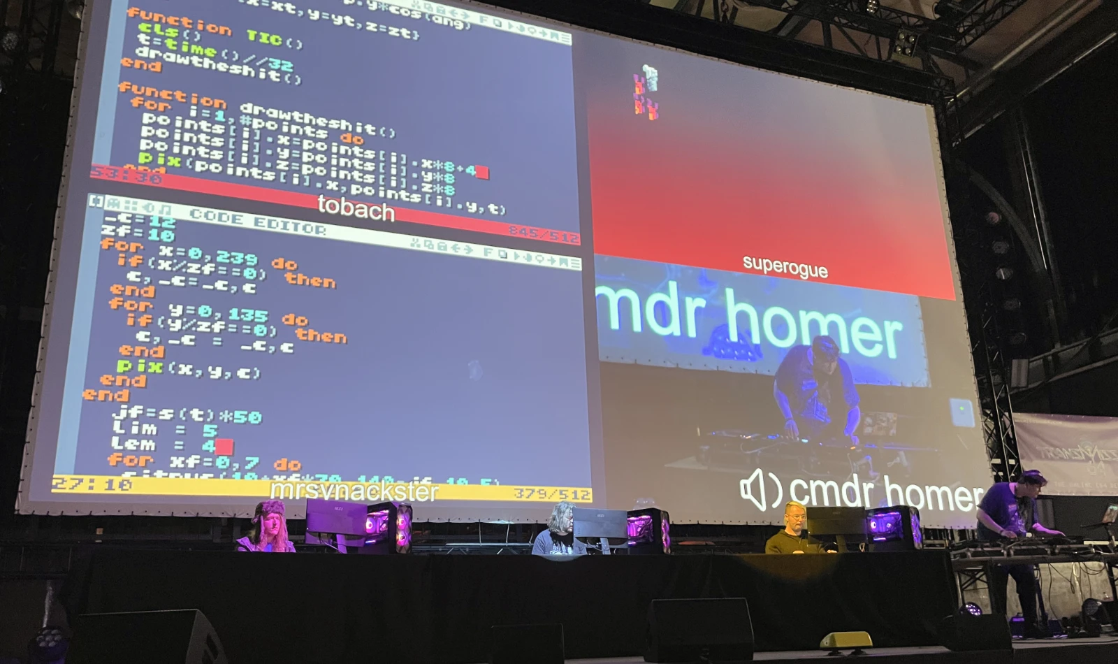 Live coding session on stage with participants coding in front of a big audience.